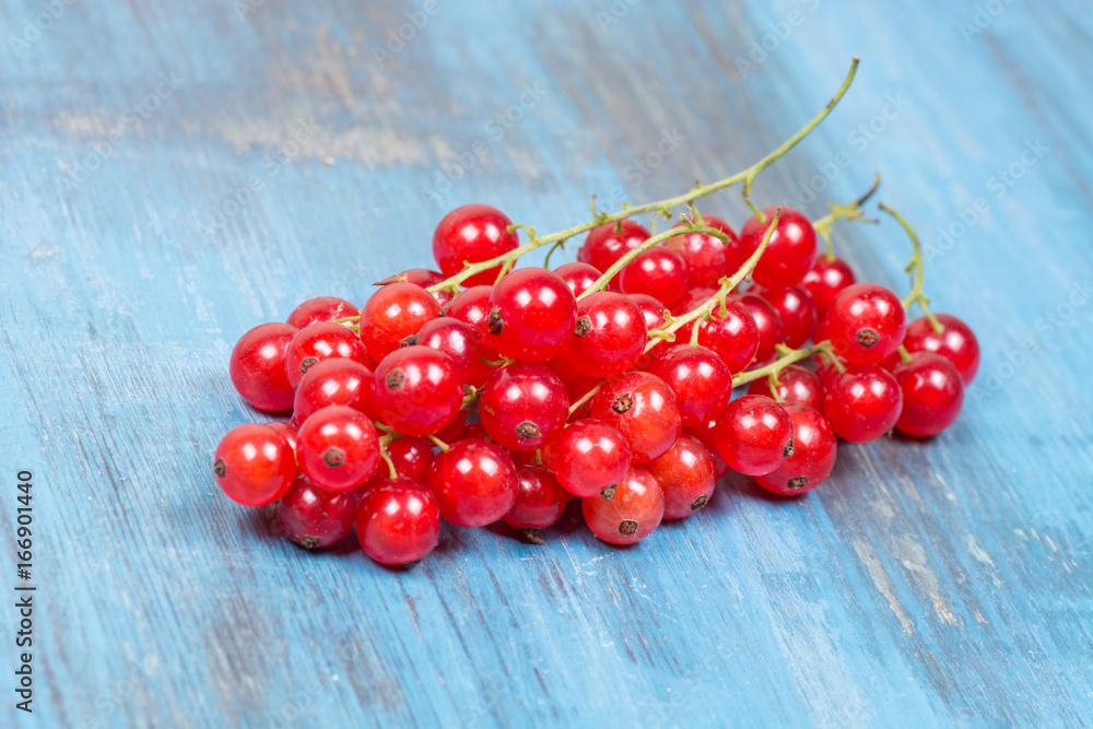 red currants on a wooden red currants on a wooden