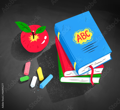 Red apple, pile of books and pieces of chalk