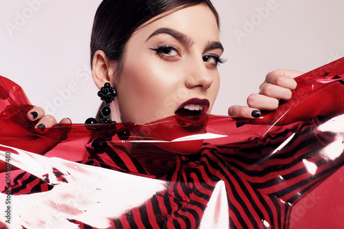Canvas Print gorgeous woman in extravagant photoshoot.