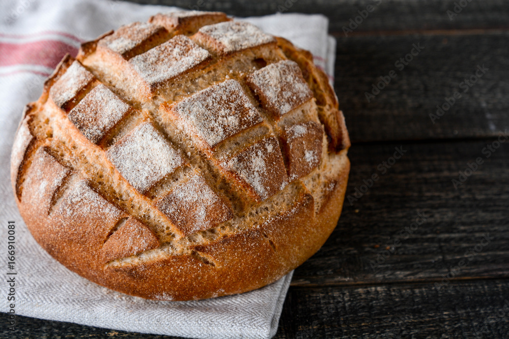 Homemade bread on a wooden background. Homemade bread on a wooden background.