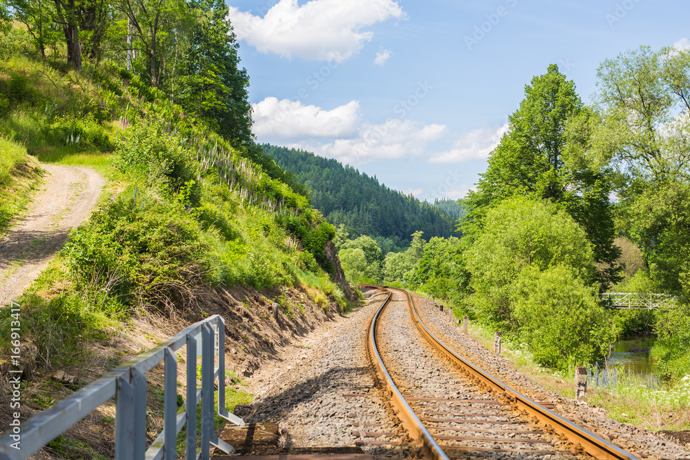 Obraz premium Railroad travel, railway tourism. Industrial concept background. Transportation