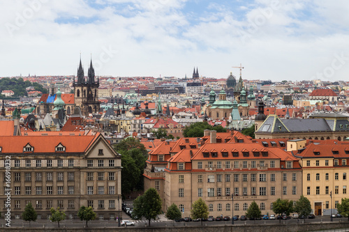 View of buildings at the Old Town and beyond in Prague, Czech Republic in the daytime.