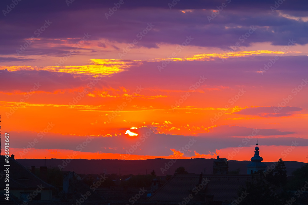 Awesome scenery of sunset over the ancient european city Sibiu in Romania