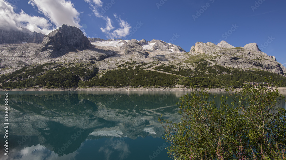 lago di fedaia at the marmolada - the highest mountain at the european dolomites 