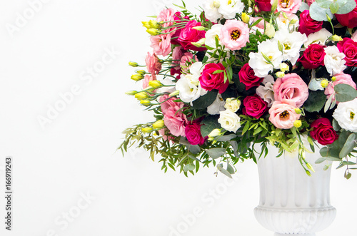 Luxurious wedding arrangement of fresh flowers © pyansetia2008