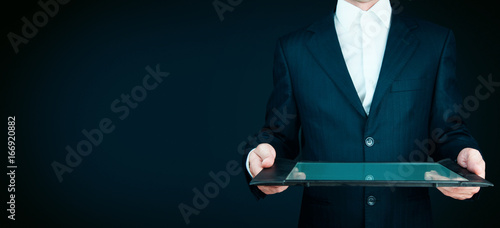 Asian business man using digital tablet computer