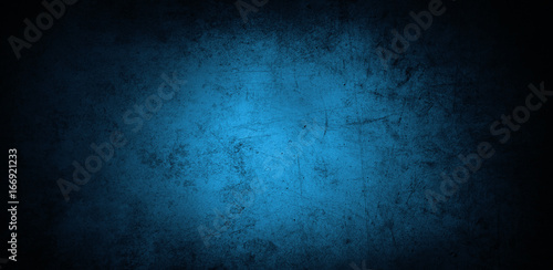 Blue concrete wall. Dark edges