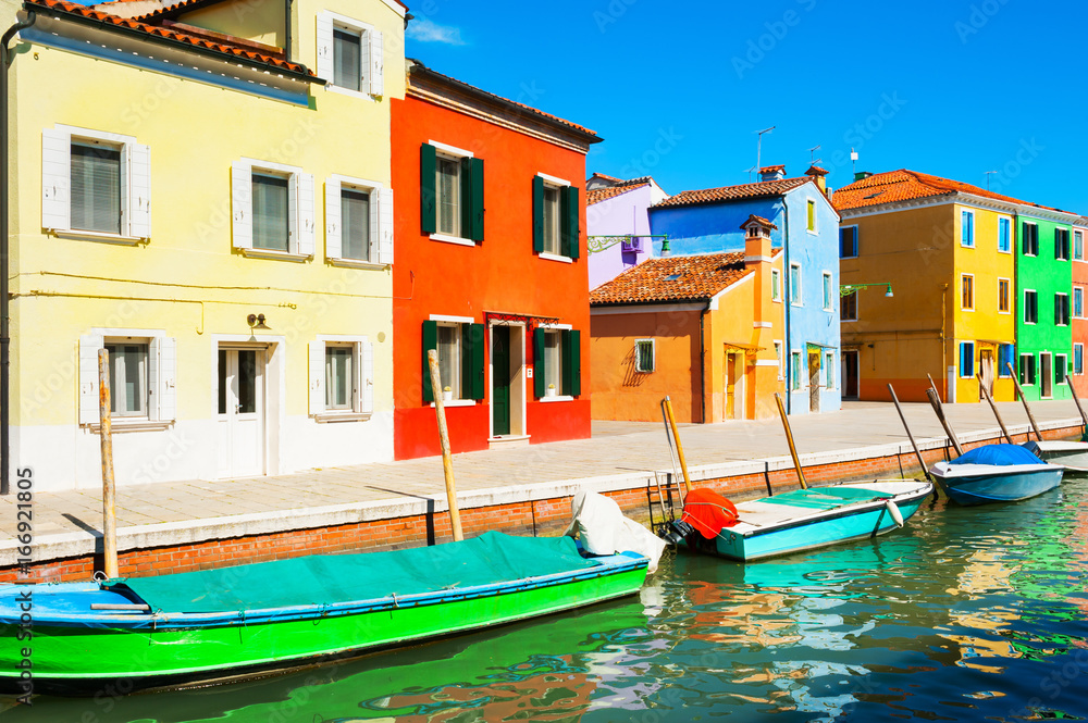 Scenic canal and colorful houses in Burano, Italy
