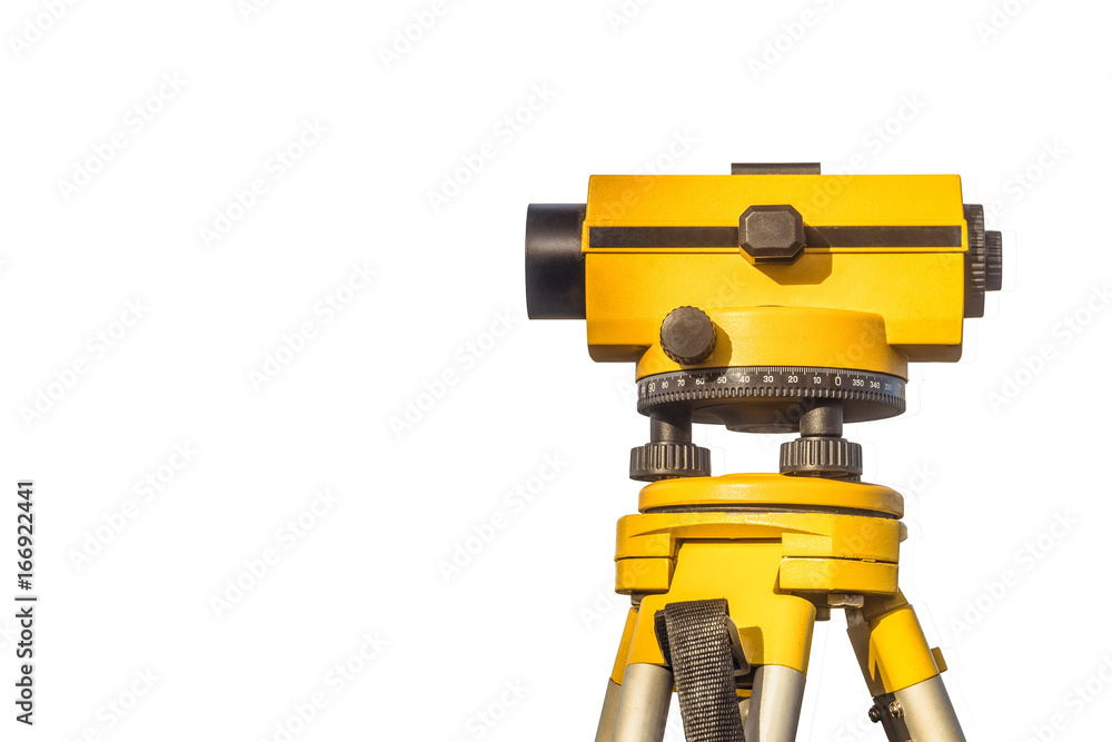 Geodetic optical level isolated on a white background. Construction engineering equipment with copy space.