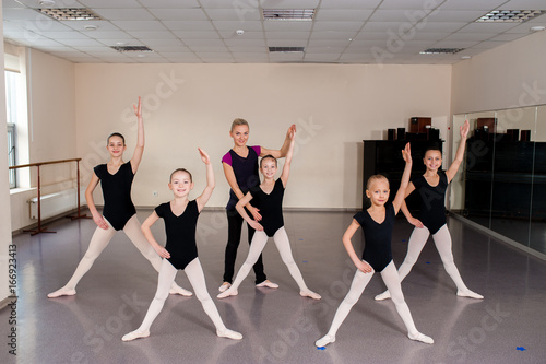 The choreographer teaches children dances.