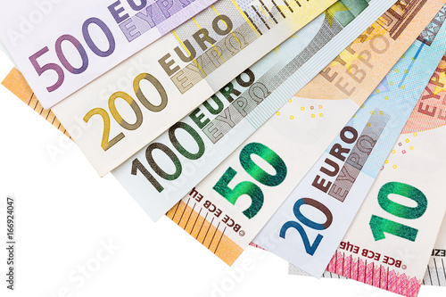 Several hundred euro banknotes on white background.