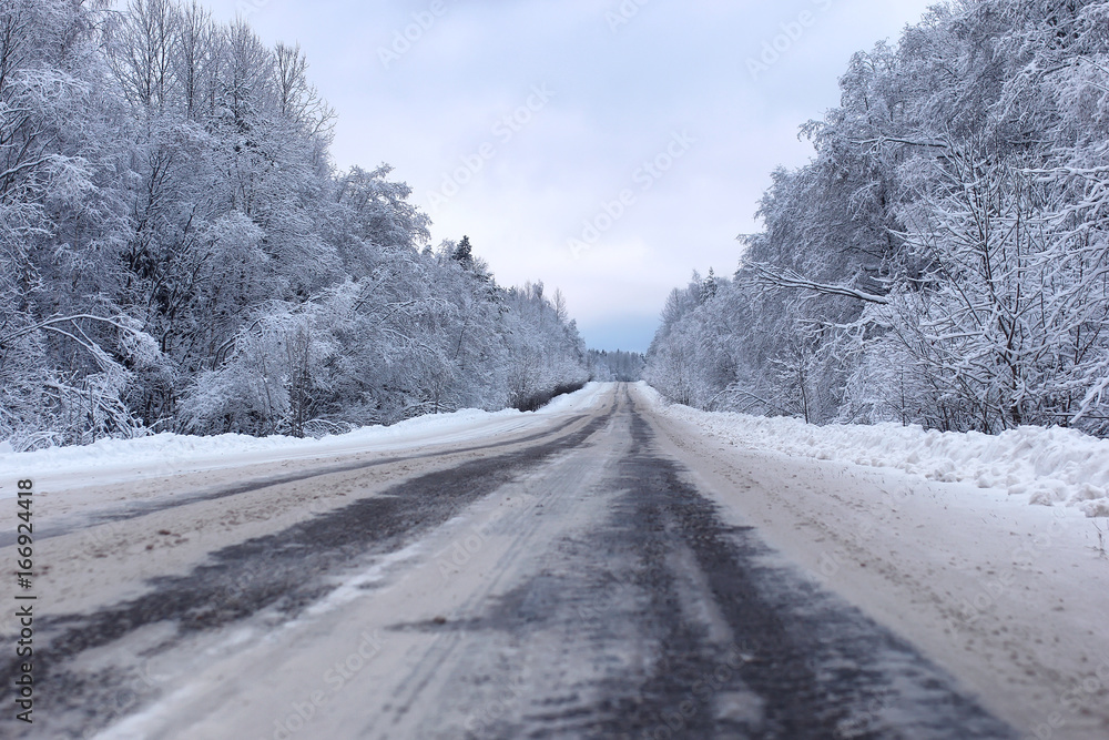 landscape Road in the winter forest with snow covered landscape Road in the winter forest with snow covered
