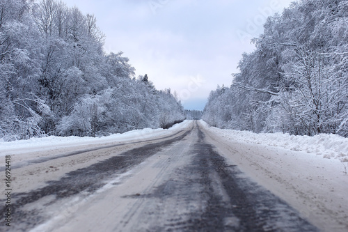 landscape Road in the winter forest with snow covered