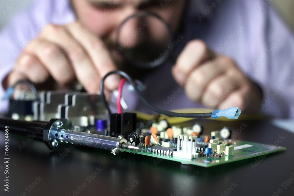 chip soldering man hands