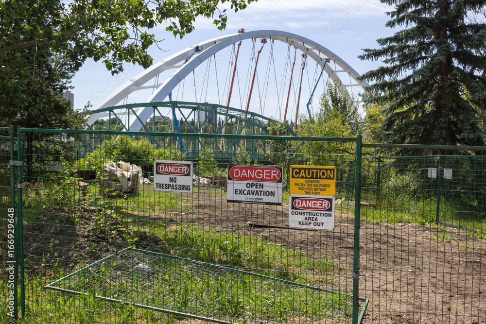Fototapeta premium New bridge under construction with existing bridge in foreground