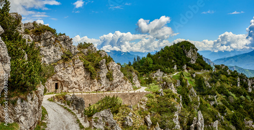 Cyclist athletes admiring the Garda Lake from Passo Tremalzo,Trails to Passo Tremalzo, Lago di Garda region, Italy, Italian Dolomites-panoramic views from the Tremalzo