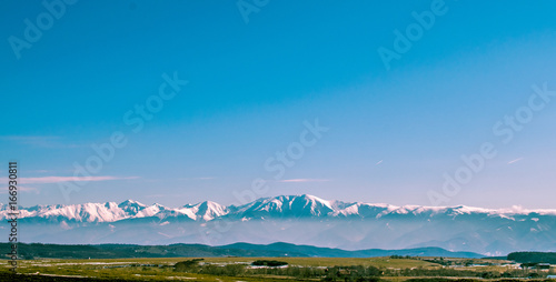 Mountains on a clear blue sky