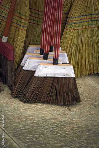 Brooms for sale in typical market of Brazil photo