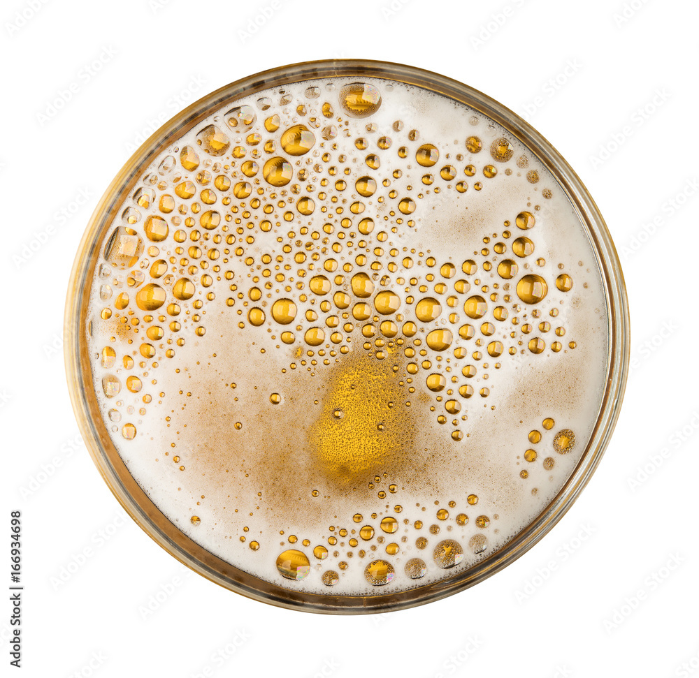Beer with bubble on glass isolated on white background top view Beer with bubble on glass isolated on white background top view