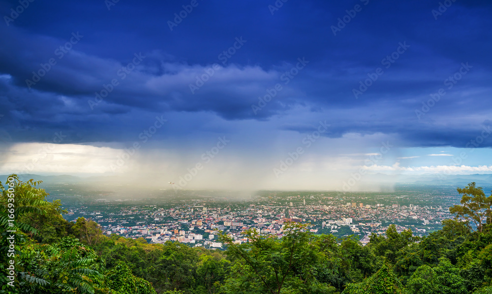 Dark storm clouds are moving at Doi Suthep view point at Chiang mai on top of mountain in Thailand.