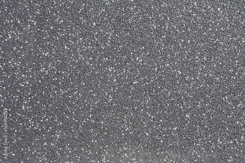 Texture of black rubber floor on playground photo