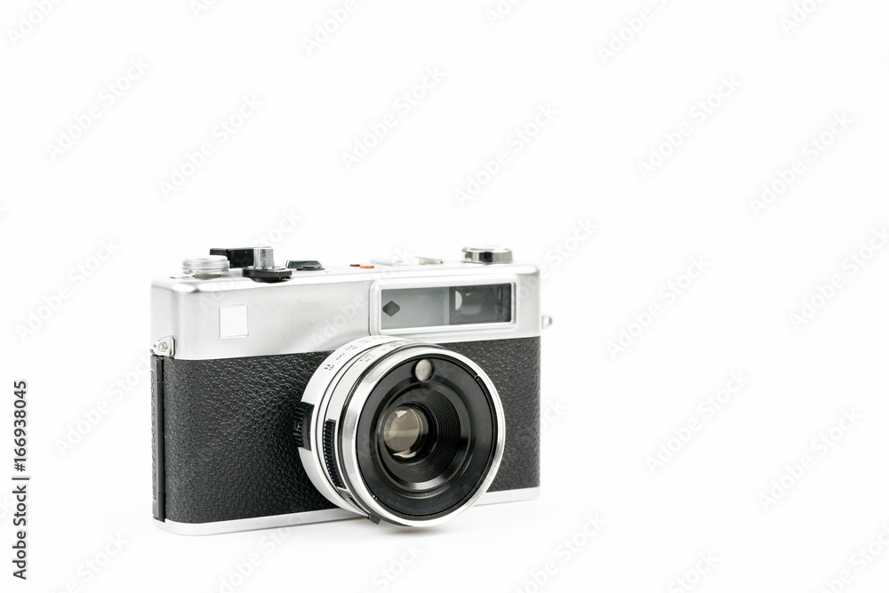 Old vintage camera on background with a space for text