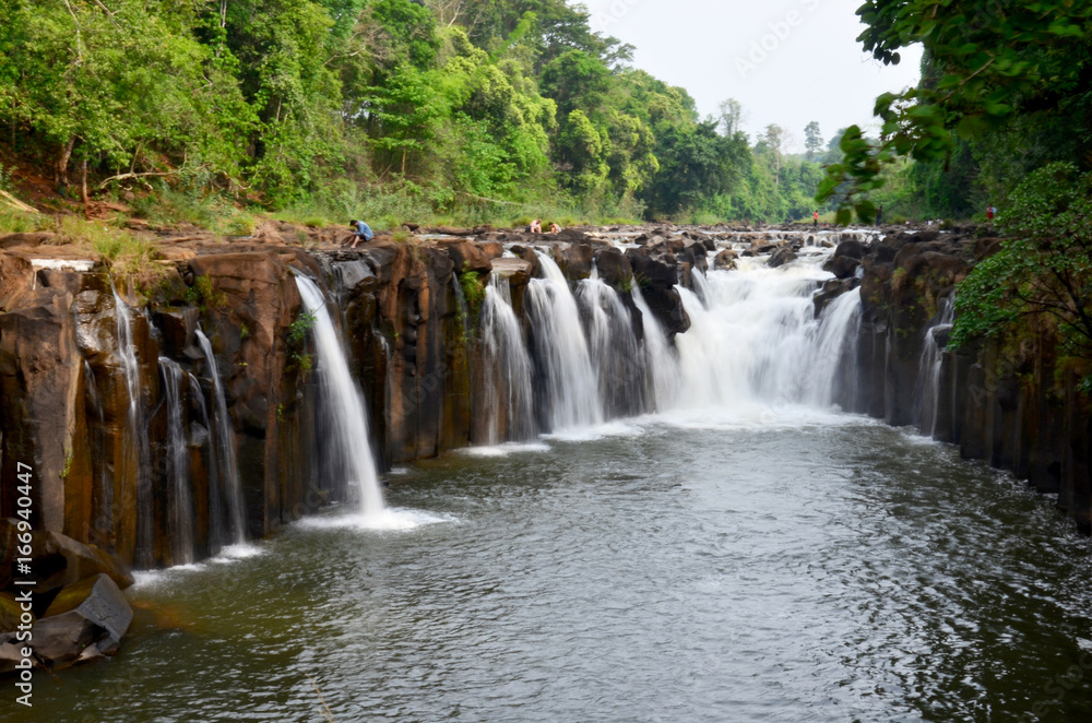 Motion and flowing water of Tad Pha Suam waterfall
