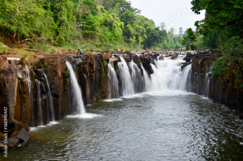 Motion and flowing water of Tad Pha Suam waterfall