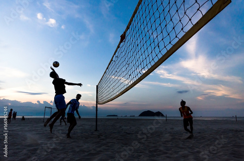 Beach volleyball Is a popular sport that is played on the beach and playground sand