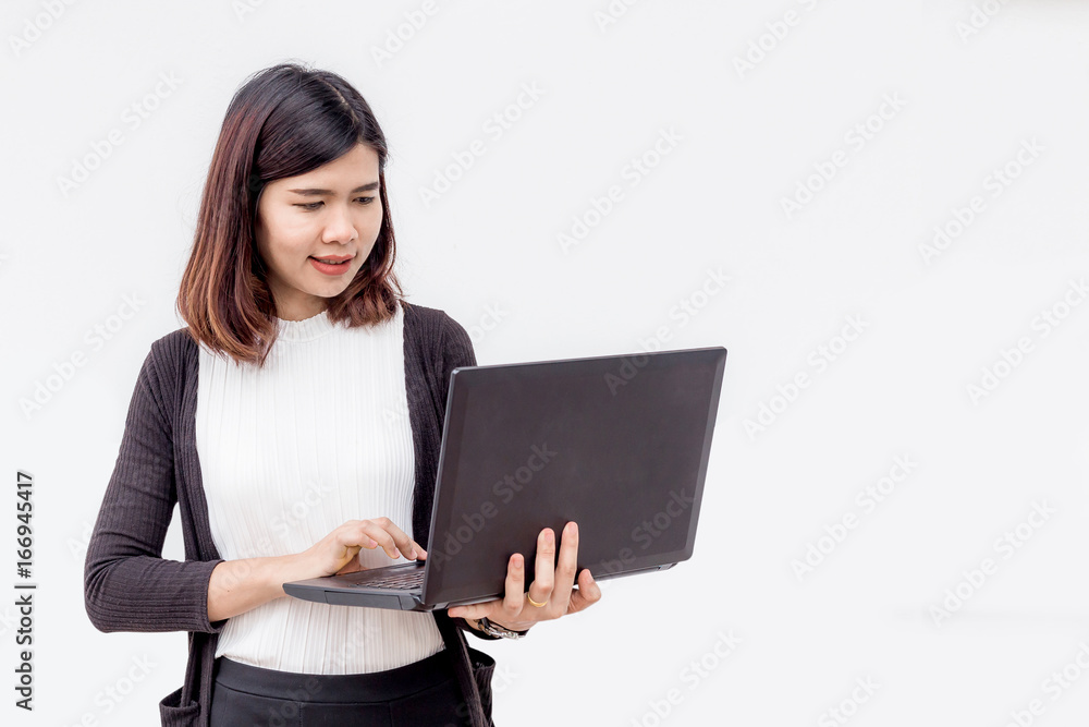 Young pretty business woman with notebook on white background Young pretty business woman with notebook on white background