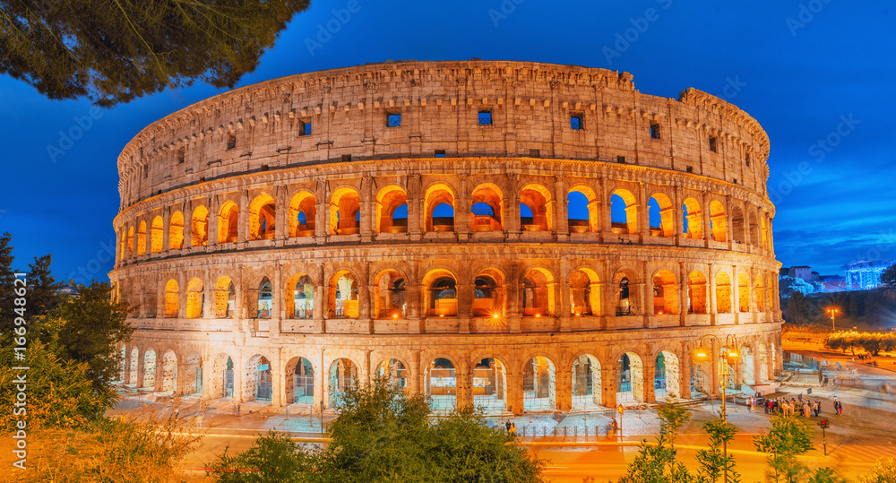 Beautiful landscape of the Colosseum in Rome- one of wonders of the world  in the evening time. Italy.