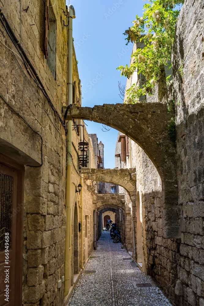 Charming narrow street at Rhodes old town, Rhodes island, Greece