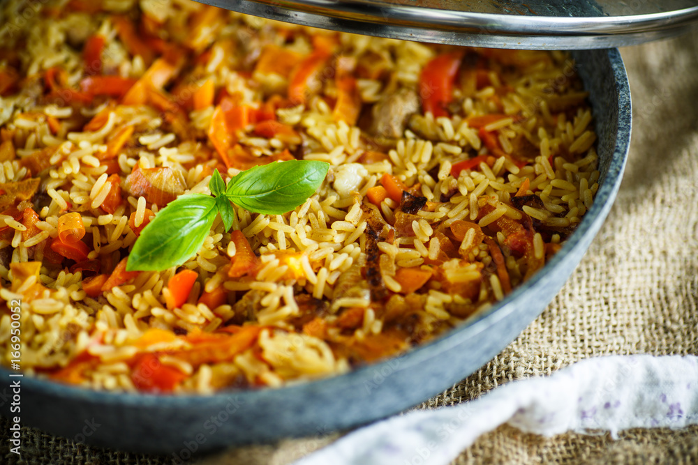 Pilaf with beef, carrots, onions, garlic, pepper and cumin. Pilaf with beef, carrots, onions, garlic, pepper and cumin.