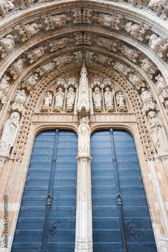 Gate and sculptures of Notre-Dame au Sablon in Brussels, Belgium