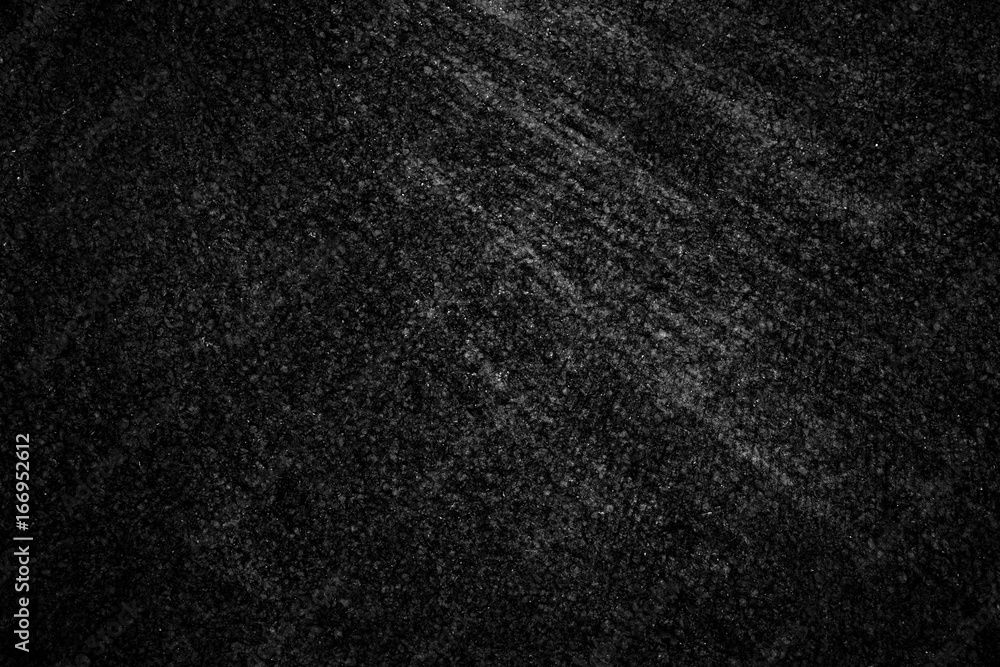 Fototapeta premium Asphalt background texture with some fine grain with road