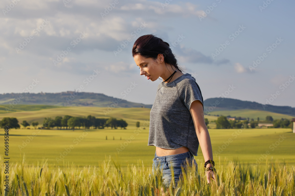 Happy beautiful woman in meadow. Freedom concept background.