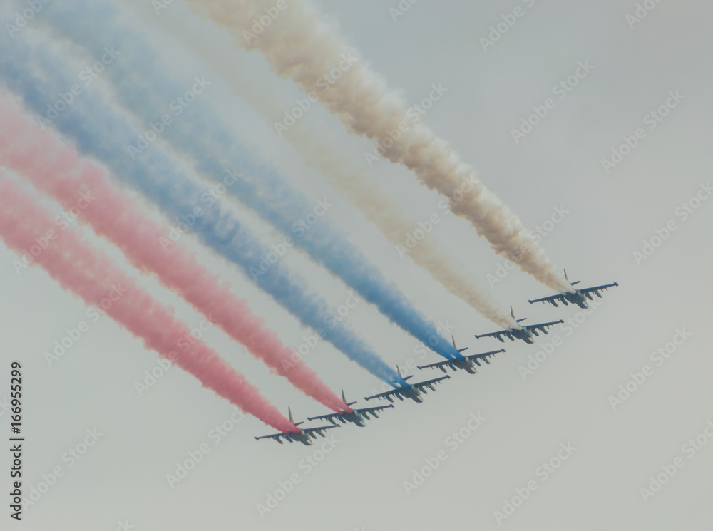Russia, Saint-Petersburg, July 30, 2017, in celebration of the Navy, the flight of aircraft made out of the smoke a Russian flag over the city.