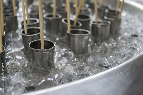 Traditional Thai Ice Cream in The Steel Bucket With Ice in Close Up
