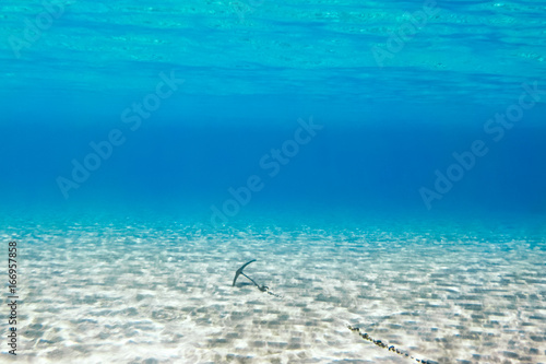 Underwater scene in tropical sandy beach, Koufonisi island, Crete, Greece.