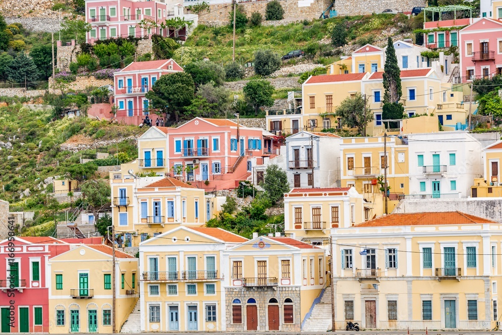 Colorful, picturesque houses at Symi island, close to Rhodes island, Greece