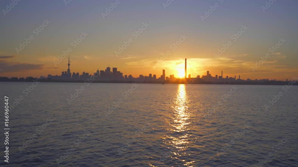 sailboat in summer on the lake ontario toronto sunset sailboat in summer on the lake ontario toronto sunset