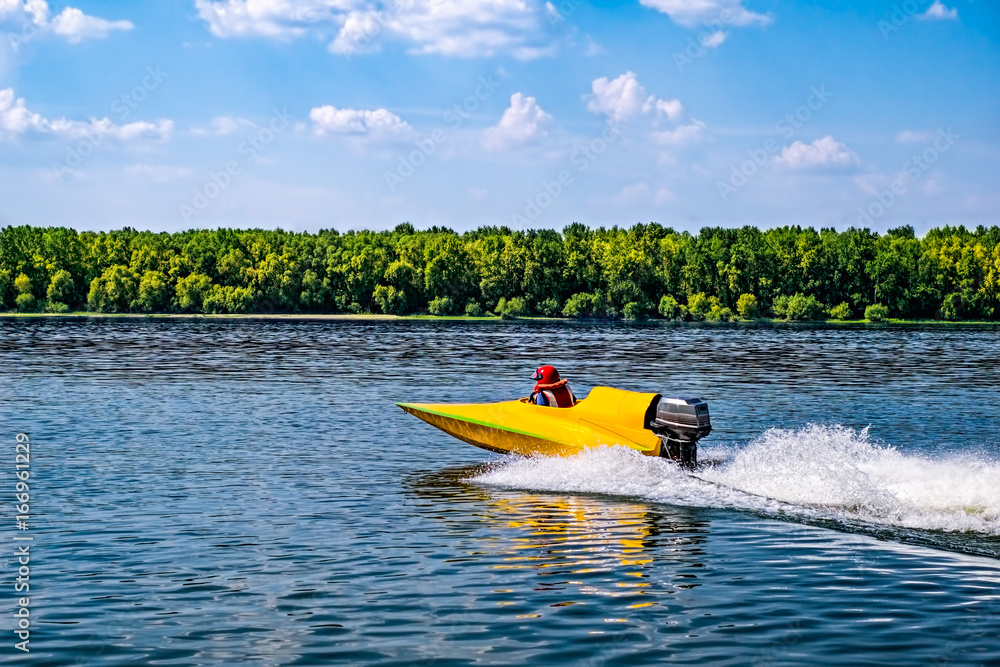 Fototapeta premium Yellow speed boat