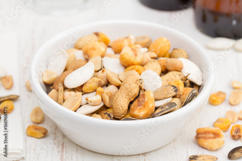 salted nuts and seeds on white dish