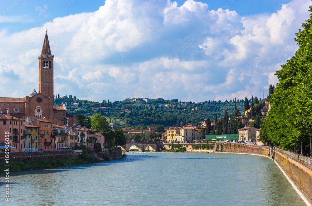 Northern Italy, Verona, the Adige River. View of the city from the bridge on a sunny day.