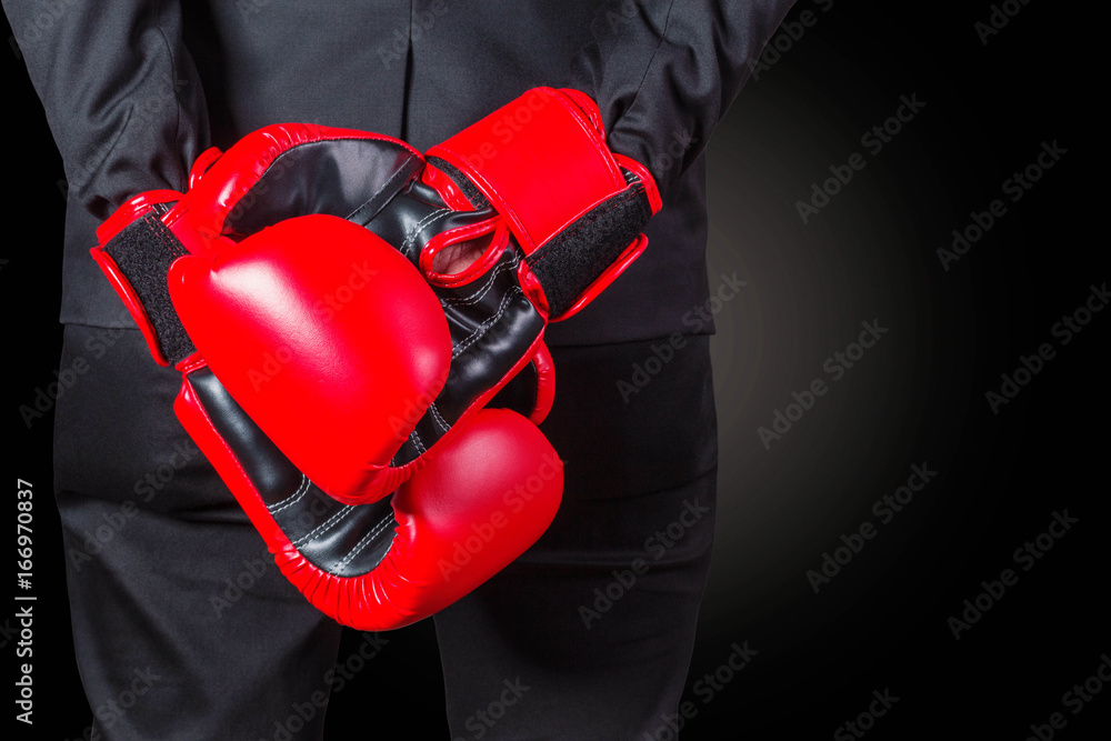 Businessman with boxing glove.