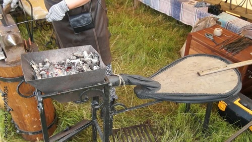 Blacksmith forging metal