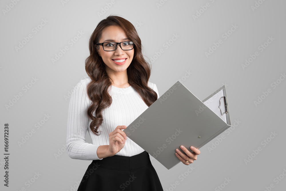 Portrait of young confident asian business woman with folder Portrait of young confident asian business woman with folder