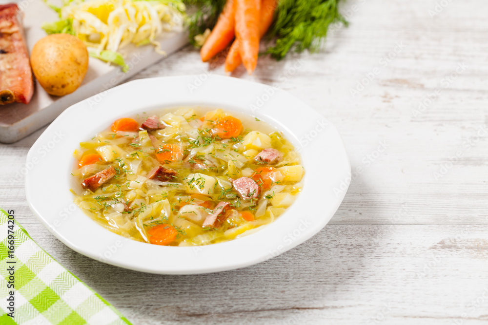 Homemade cabbage soup, cooked on smoked ribs. Homemade cabbage soup, cooked on smoked ribs.