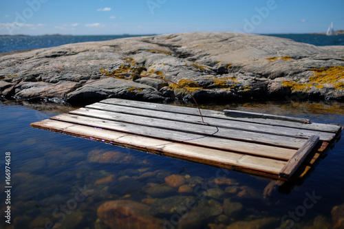 wooden plank at Vrango coast photo