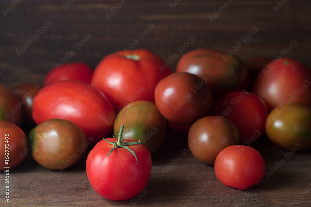 fresh ripe tomatoes on a wooden rustic table fresh ripe tomatoes on a wooden rustic table